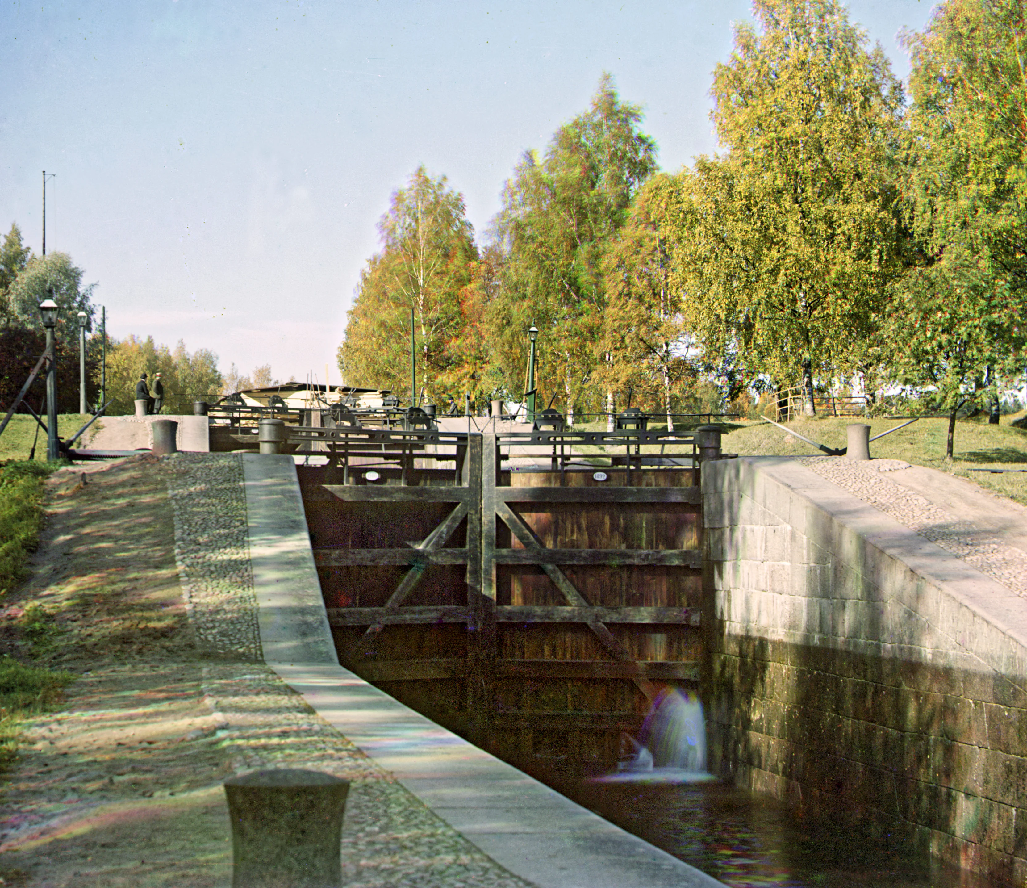 Very old (circa 1910) photo taken on three glass negatives of the Rättijärvi lock in the Saimaa Canal